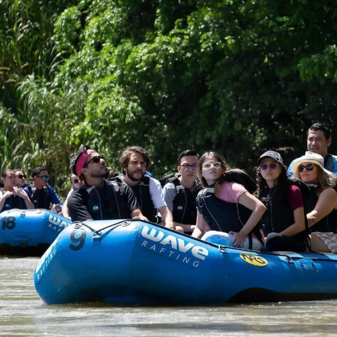 Group enjoying a scenic river rafting tour with Wave Rafting in Costa Rica
