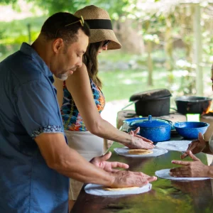 Guests making fresh tortillas during the Safari Float & Tortilla Making experience with WAVE